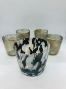 A selection of glassware to include four distressed glass votives and a small contemporary vase