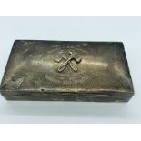 A Windsor Fire Brigade silver cigarette box, hallmarked Birmingham 1933-34, makers mark WWC, with