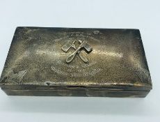 A Windsor Fire Brigade silver cigarette box, hallmarked Birmingham 1933-34, makers mark WWC, with