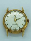 A vintage gold Omega seamaster automatic watch lacking strap