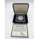 A 1979 10 Crown silver proof coin for Turks and Caicos by the Royal Mint of London