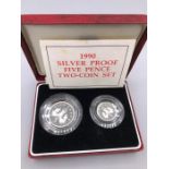 A 1990 Two coin Five Pence silver proof boxed set.