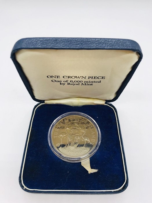 A cased Turks and Caicos Islands, one crown piece, silver proof coin
