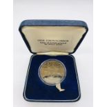 A cased Turks and Caicos Islands, one crown piece, silver proof coin