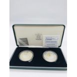 A 2000 United Kingdom Millennium £5 silver proof coin set 1999/2000 in box.