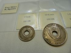 A selection of three coins from East Africa and Uganda 1911 One cent, 1911 Ten Cents and 1912 One