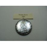 A Great Britain 1889 4 Shillings silver coin VF. Victoria with Shields to reverse. Second I is an