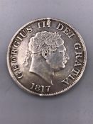 A Great Britain 1817 Half Crown, holed on edges, VF George III with Crown, Shield and Harter to