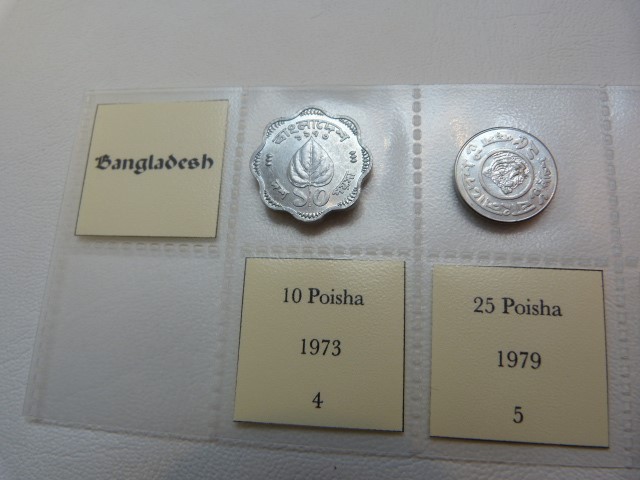 A selection of fourteen coins from Bangladesh from 1974, various denominations.