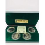 A Boxed set of Four Cupro-Nickel coins celebrating the Year of the Disabled