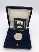 An Egyptian 1987 Five Pounds silver proof coin with paperwork