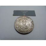 An 1884 Franz Joseph 5 Corona Austrian coin