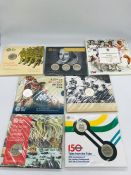 A selection of Royal Mint uncirculated £2 coin sets in packs: 150th Anniversary of the London