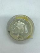 A silver proof Canadian One Dollar coin