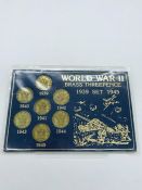 A Great Britain World War II Brass threepence 1939-1945 set