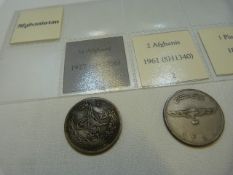 A Collection of Five coins from Afghanistan from 1895 to include ½ Afghani, 2 Afghani, 1 Piasa, 1
