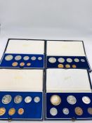 Four South African proof coin sets for the years 1968, 1973, 1980 and 1983