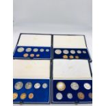 Four South African proof coin sets for the years 1968, 1973, 1980 and 1983