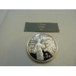 A 1994 silver proof Chinese 5 Yuan coin