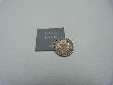 A 1911 Australian George V three pence coin