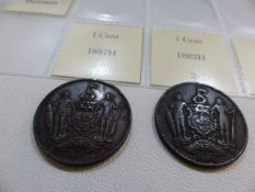 A selection of four coins from British North Borneo dates 1882, 1887, 1889, 1927, three one cent and
