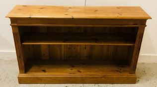 A Pine shelving unit with two shelves.