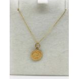 A 9ct gold chain and St.Christopher