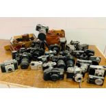 A Large volume of Cameras and cases.