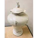 A white lidded Chinese vase, lid with Foo dog finial.