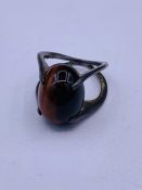 A Tigers Eye ring in a silver mount