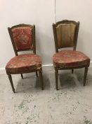 A Pair of Gilt Hall Chairs on reeded turned legs