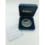 An RMS Titanic Centenary silver proof $5 coin with coal inset