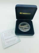 An RMS Titanic Centenary silver proof $5 coin with coal inset