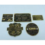 A selection of brass plaques.