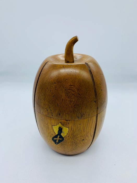 A fruitwood melon shaped tea caddy