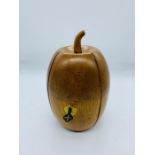 A fruitwood melon shaped tea caddy