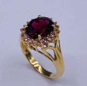 A 14ct Yellow gold substantial tourmaline and diamond ring