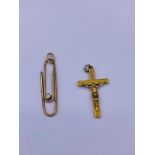 Two 9ct gold pendants a cross and a paperclip. 2.3g