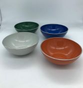 Four mid century primary colour style bowls