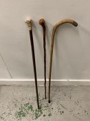 Three Walking sticks of various designs