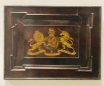 An Antique Coat of Arms, on a door panel.