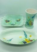 Three Hand painted Radford items to include plates and a vase.