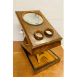 An Antique magnifier or viewfinder.