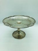 A Silver cake stand with pierced floral design, hallmarked London 1924 (CCP Makers MArk)