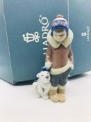 Lladro Figure, Eskimo Boy with Pet with original Box and Paperwork