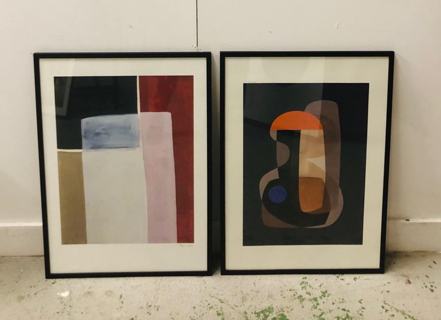 A pair of framed abstract prints