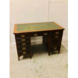 Thomas Turner 1861 Oak Writing Desk with green leather top on brass castors (H 75 X W 114 X D 63CM)