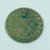 An 1897 Threepence coin