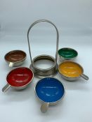 An interesting white metal and enamel Rowenta ashtrays