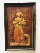 A framed image of a mother and child in leather.